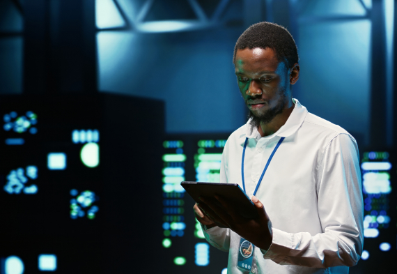 Young Man Holding Tablet